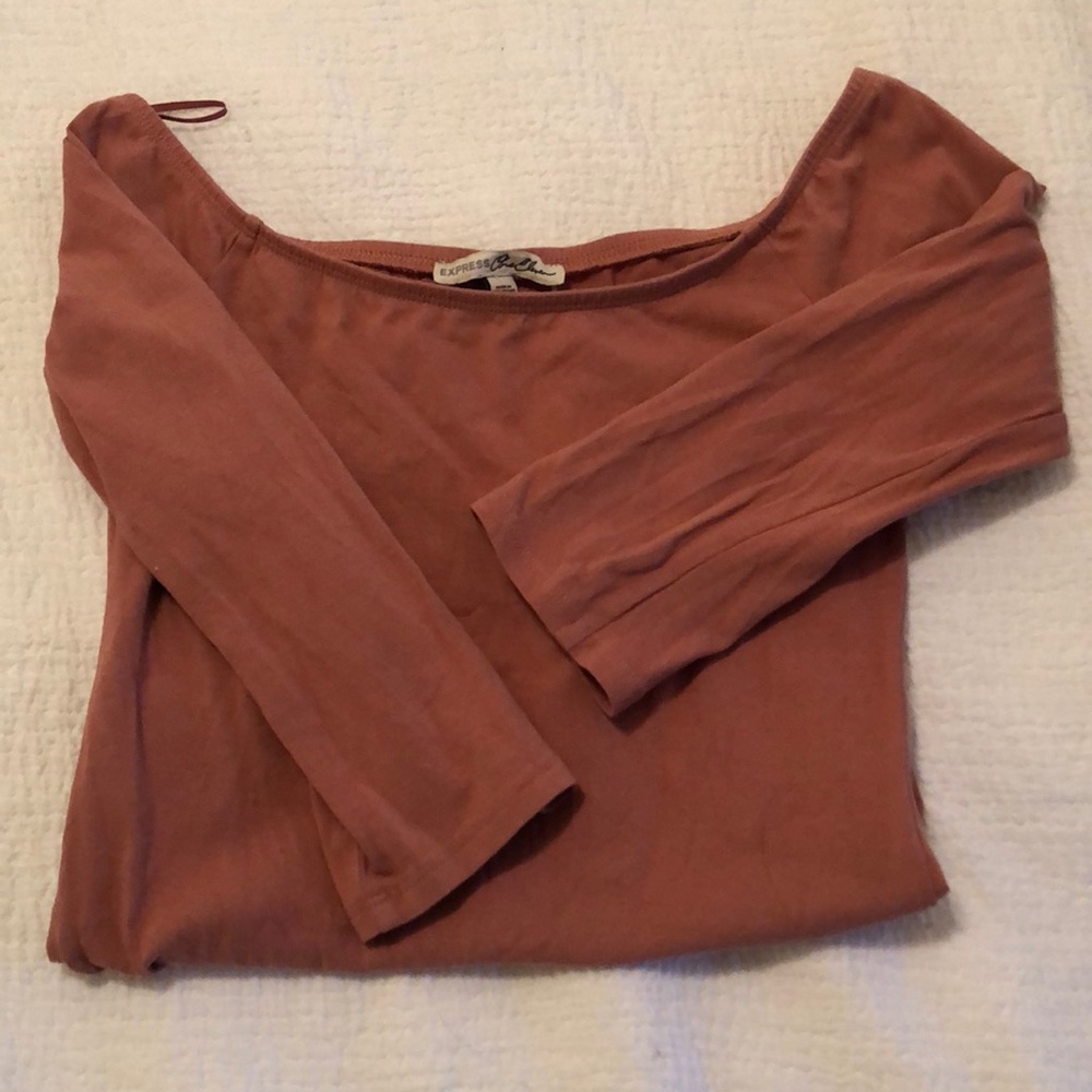 Mauve bodysuit. 3/4 sleeve. Tight fitted.